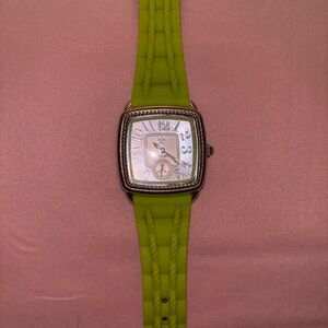 Judith Ripka watch with green band and mother of pearl watch face